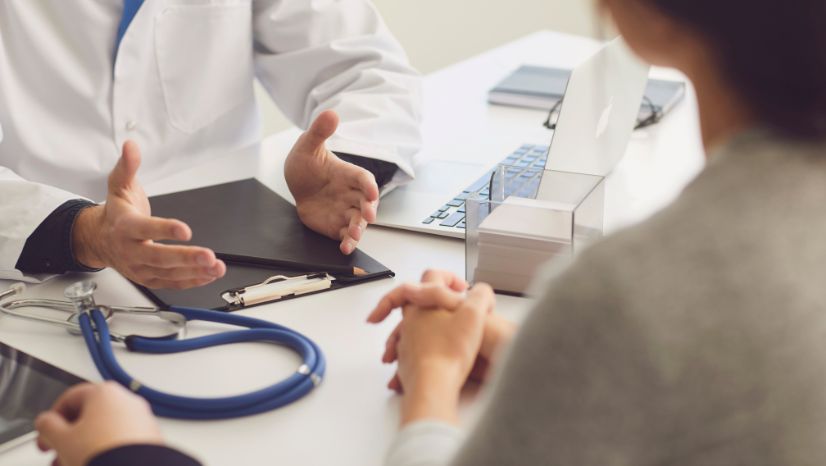 Doctor talking to patient